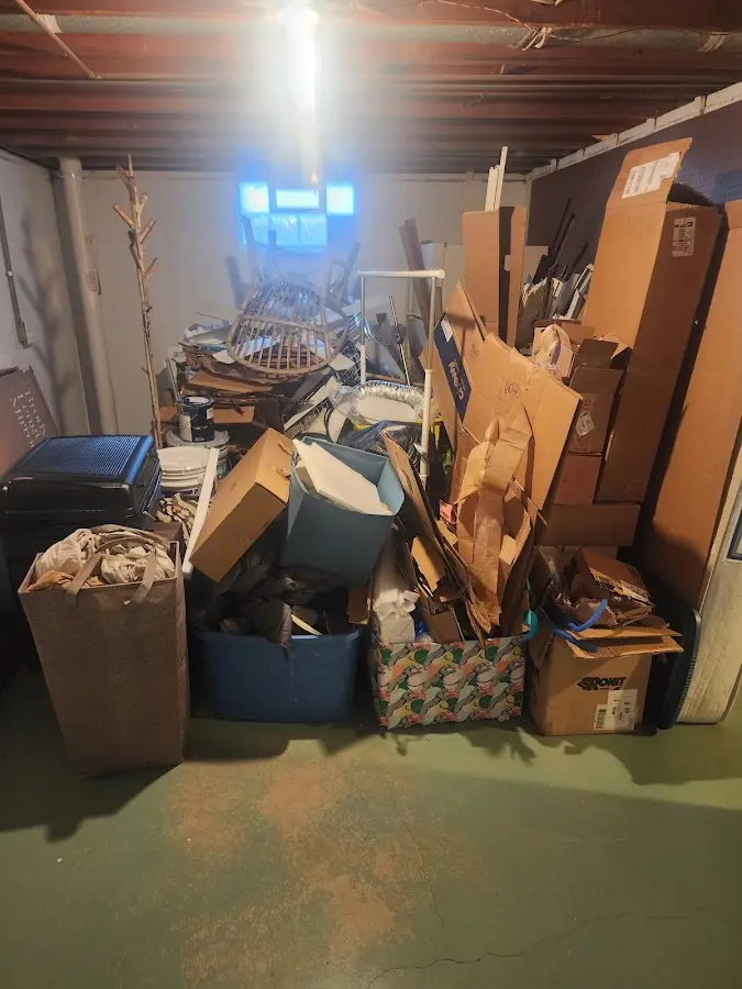 Roll-off dumpster container at job site for Yard Waste Dumpster Rental in New London